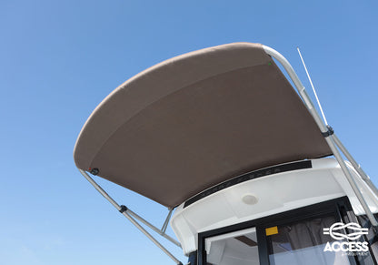 Sun protection for the wheelhouse of a motorboat